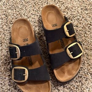 Birkenstock Black Sandals with Gold Accents
